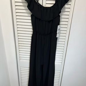 Black Romper Dress shorts under & skirt in the back  open in front. Best of both